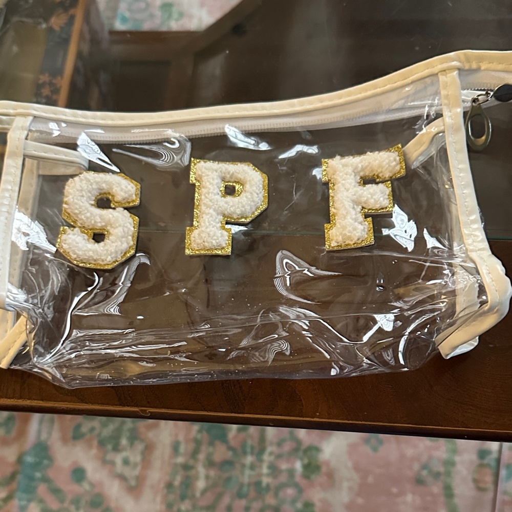 Clear Cosmetic Bag with Gold Trim